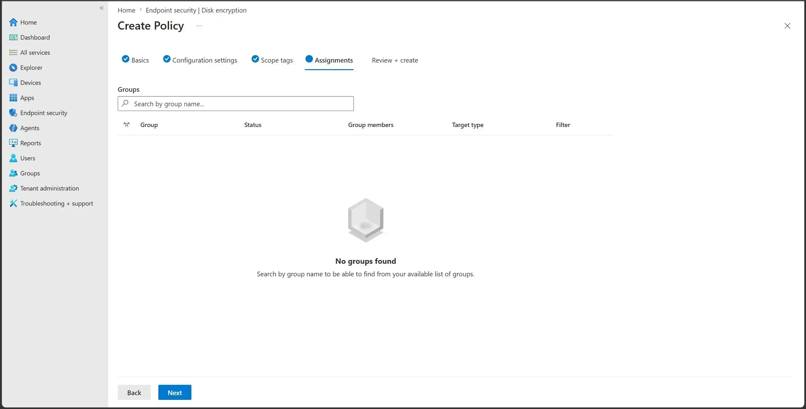 Intune BitLocker policy Assignments tab with a pilot device group included