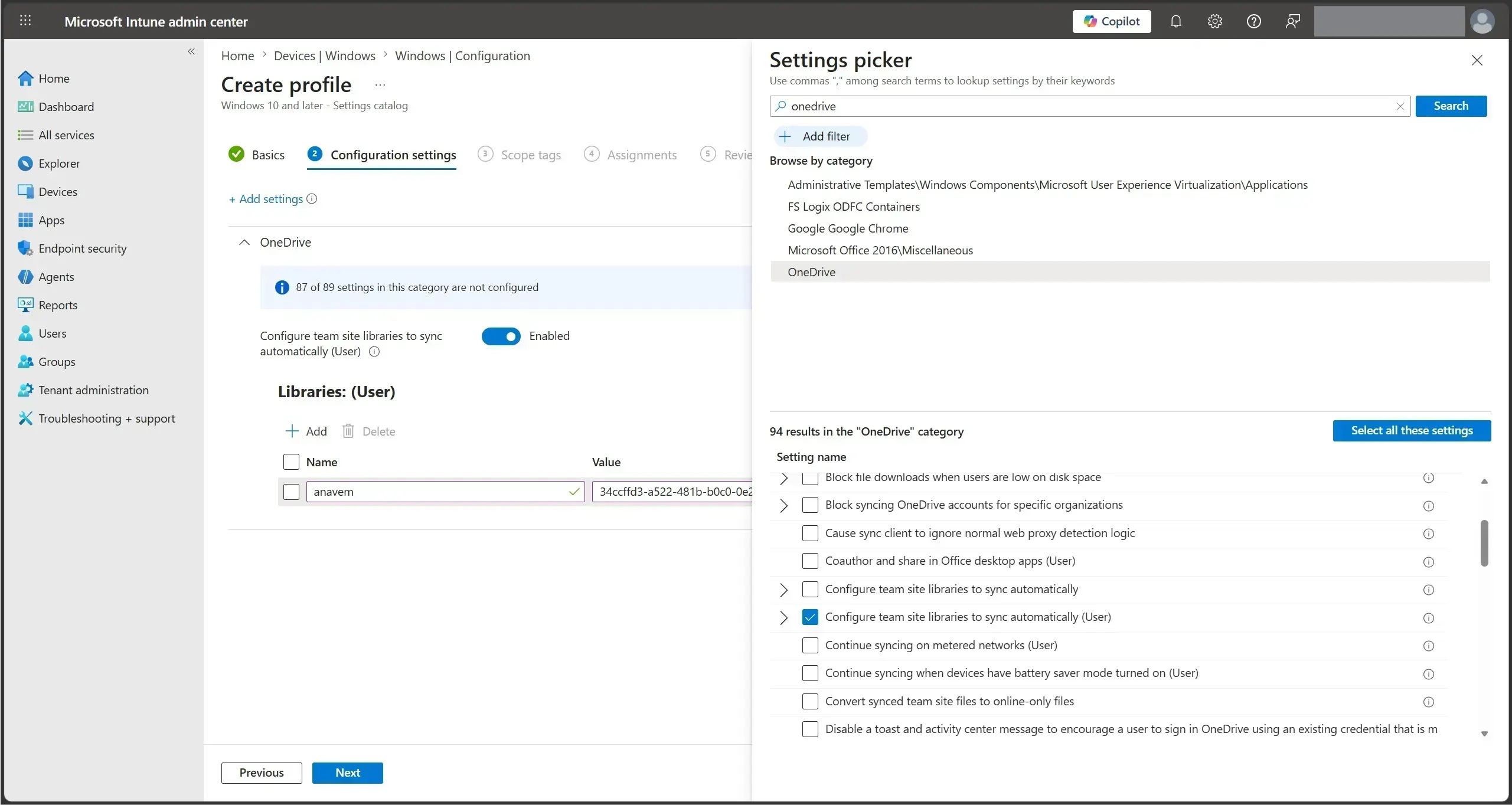 OneDrive setting Configure team site libraries to sync automatically enabled with a library name and ID entered